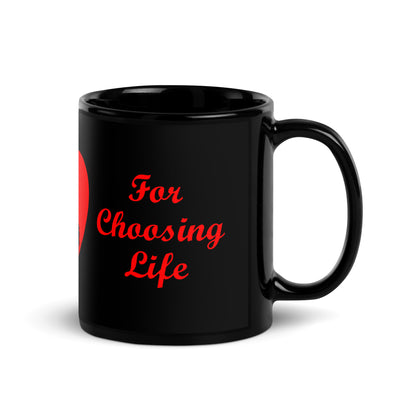 A002 Mug - Black Glossy Ceramic Mug Featuring Mother and Baby Graphic with text “Thank Your Mother For Choosing Life.”