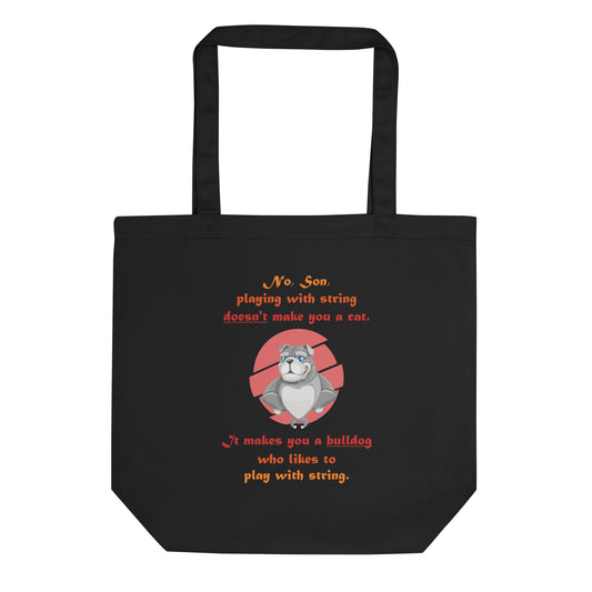 A003 Tote – Eco Tote Bag Featuring Papa Bulldog Telling His Son, “Playing with String Doesn’t Make You a Cat.”