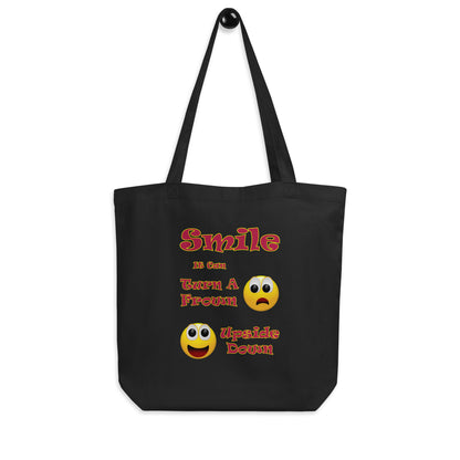 A008 Tote – Eco Tote Bag Featuring a Smiley Graphic With the Text “Smile - It Can Turn a Frown Upside Down”