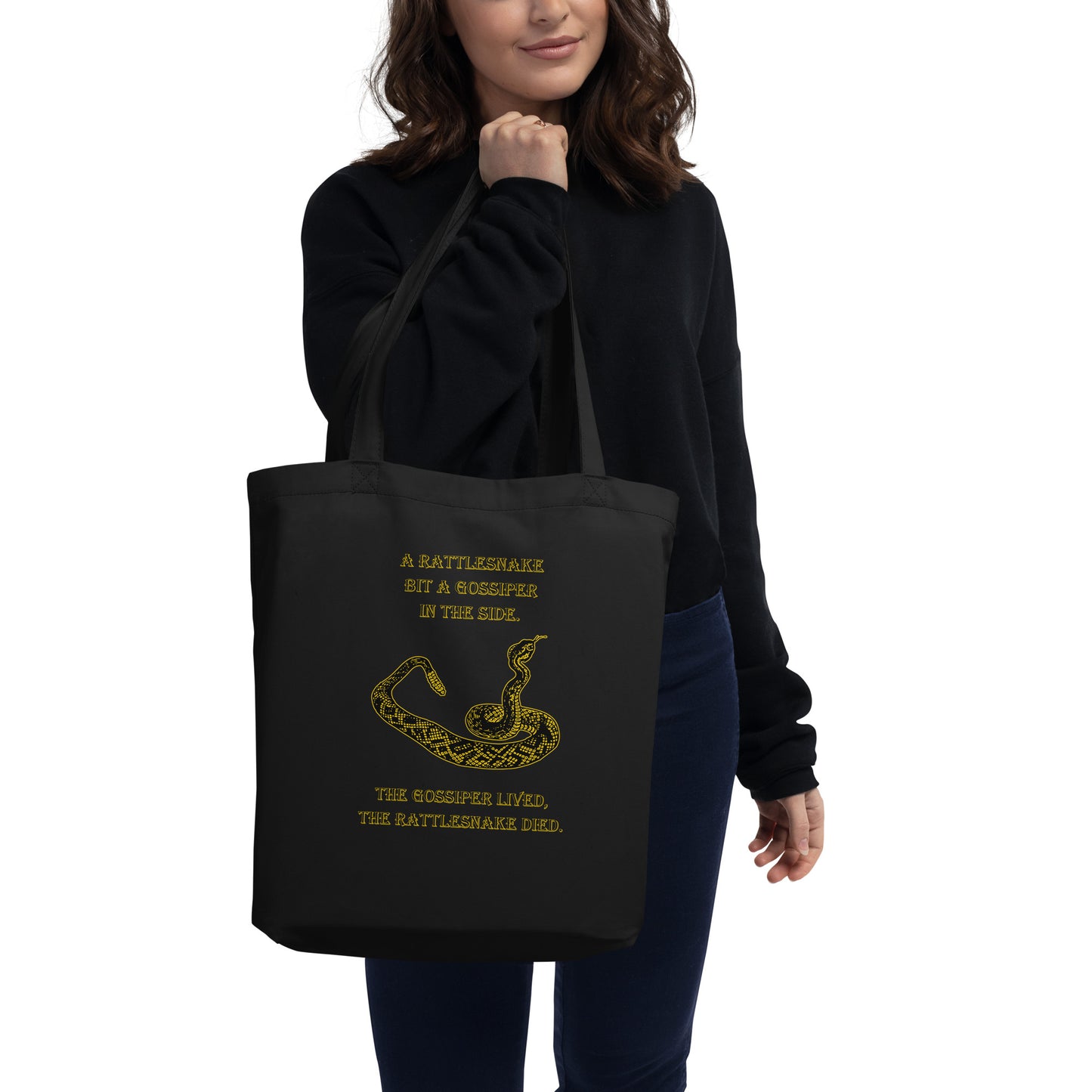 A010 Tote – Eco Tote Bag Featuring a Rattlesnake Graphic and the Text “A Rattlesnake Bit a Gossiper in the Side – The Gossiper Lived, The Rattlesnake Died.”