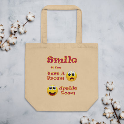 A008 Tote – Eco Tote Bag Featuring a Smiley Graphic With the Text “Smile - It Can Turn a Frown Upside Down”