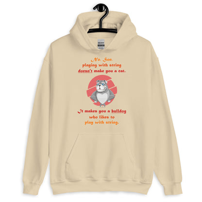 A003 Hoodie – Gildan 18500 Unisex Hoodie Featuring Papa Bulldog Telling His Son, “Playing with String Doesn’t Make You a Cat.”